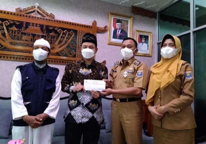 Wakil Walikota Metro Berikan Santunan Kepada Juara MHQH XIII