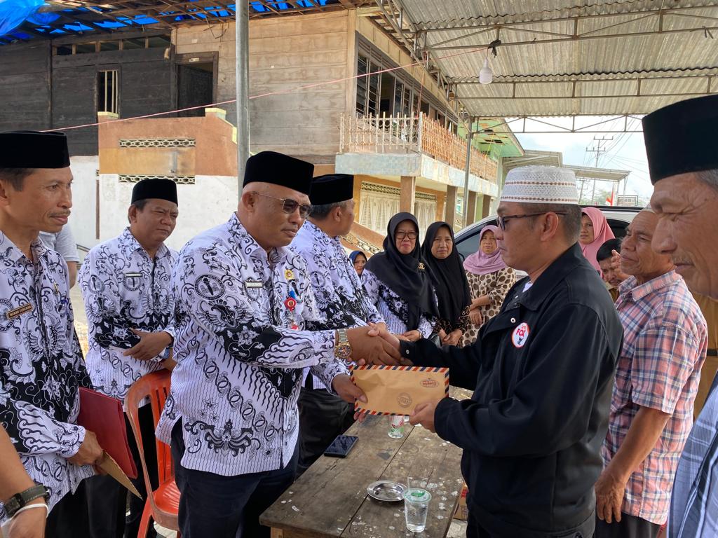 PGRI Lampung barat berikan bantuan Untuk Korban kebakaran
